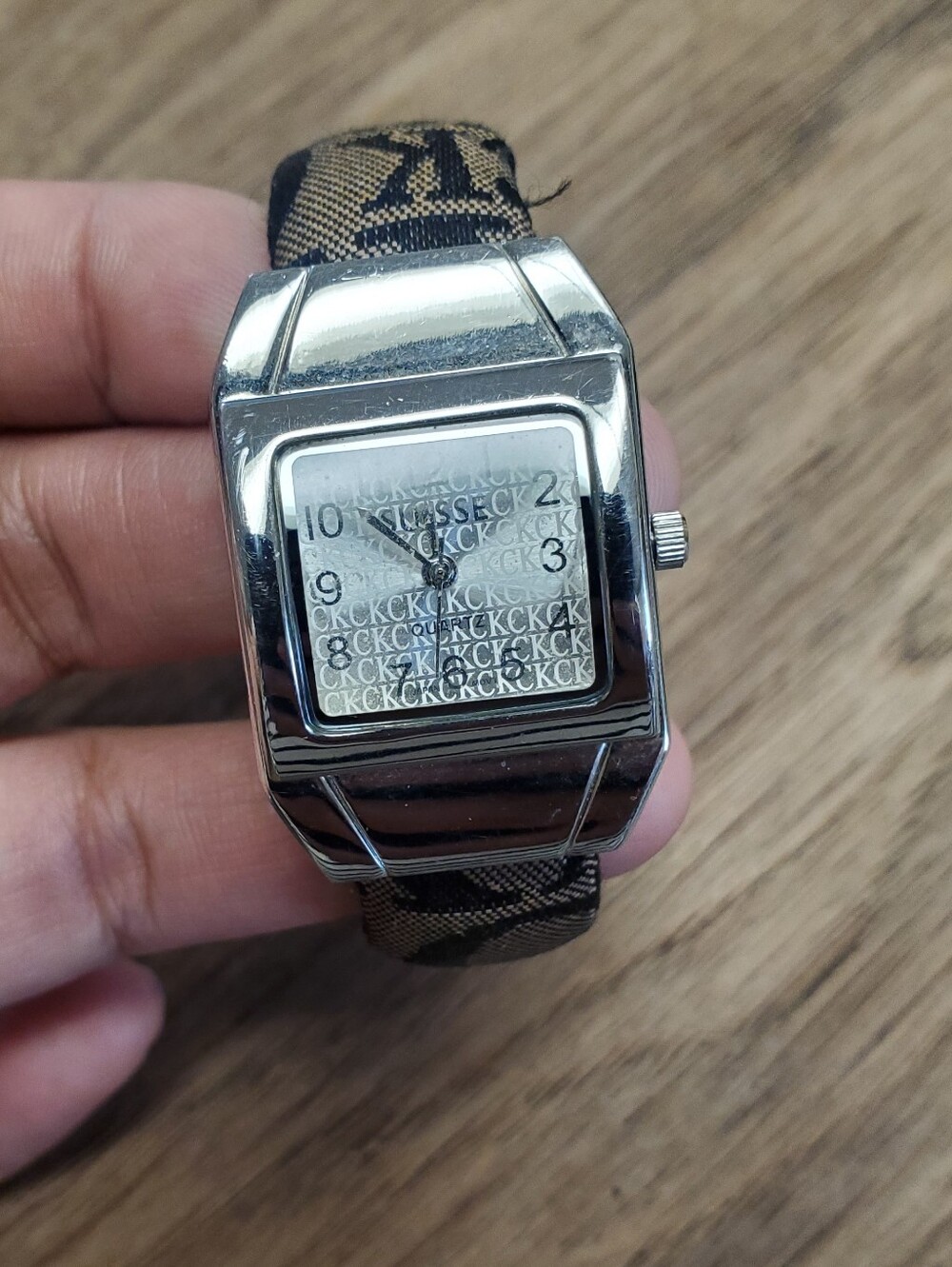 Calvin Klein Silver Rectangular SUISSE Dial Watch with Brown & Black Logo Strap